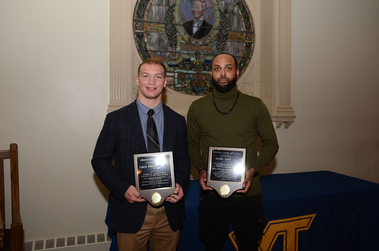 Junior wrestler Talon Pisarchuk and 1W4 graduate Justin Swift were honored at Williamson's 56th annual Sports Awards ceremony