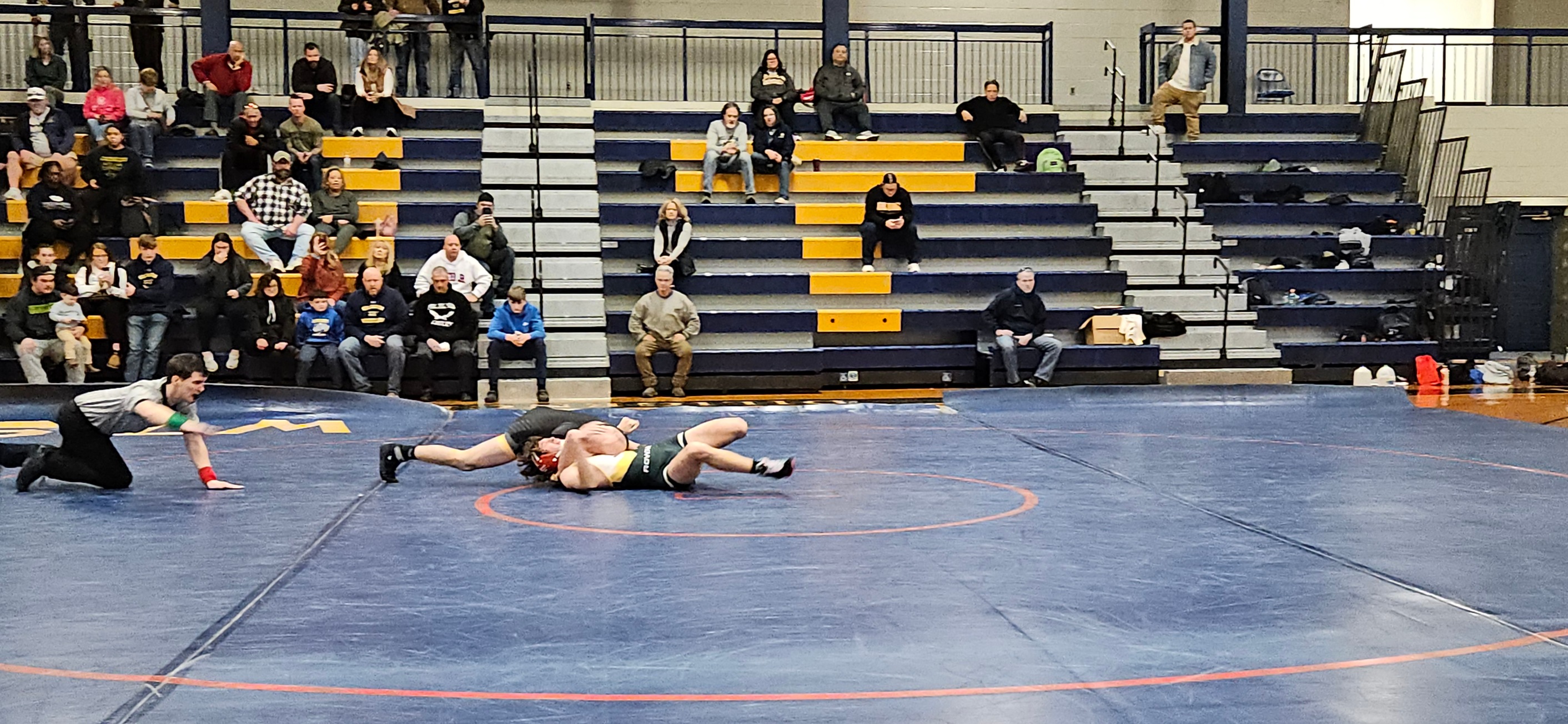 Chase Whartnaby picks up a pin as part of Williamson's big 41-24 win over Rowan University