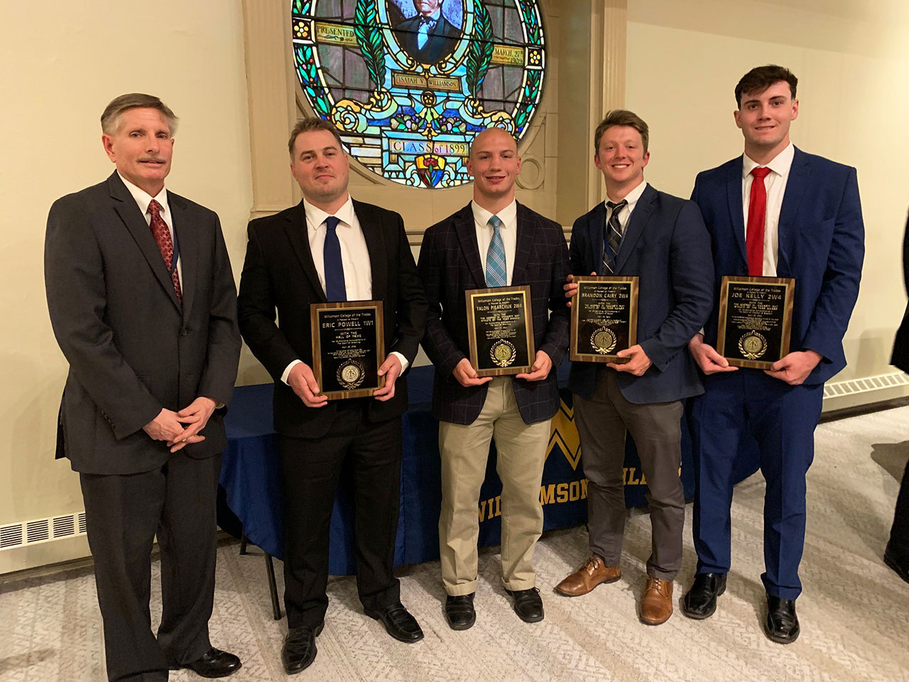 Director of Athletics Dale Plummer with Hall of Fame inductee Eric Powell 1W1 and Walter G. McCarty Athlete of the Year winners Talon Pisarchuk, Brandon Cairy and Joe Kelly
