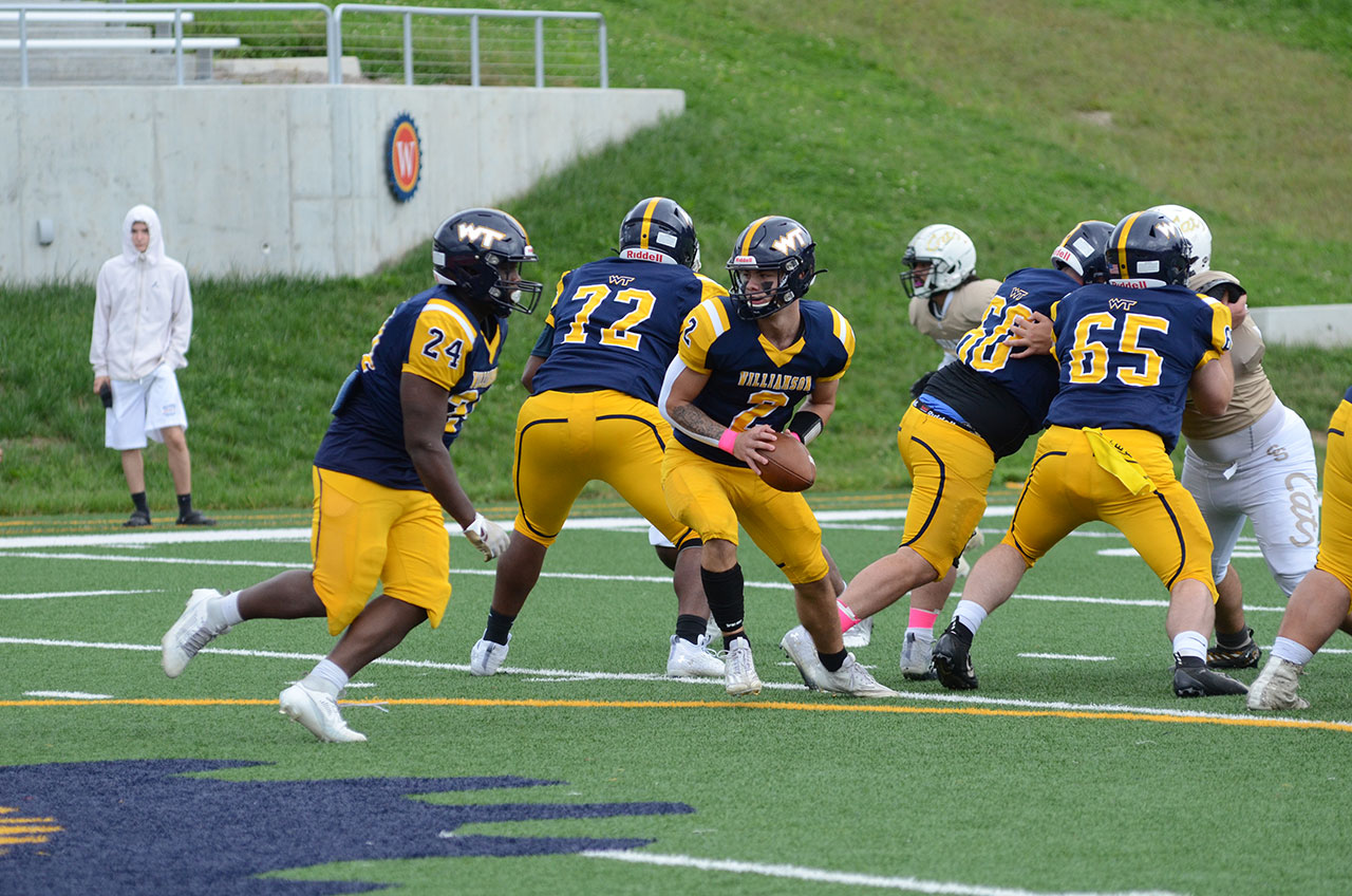 Nasir Bowman goes for 16 of his team high 69 yards rushing in Williamson's 20-12 win over Connecticut State