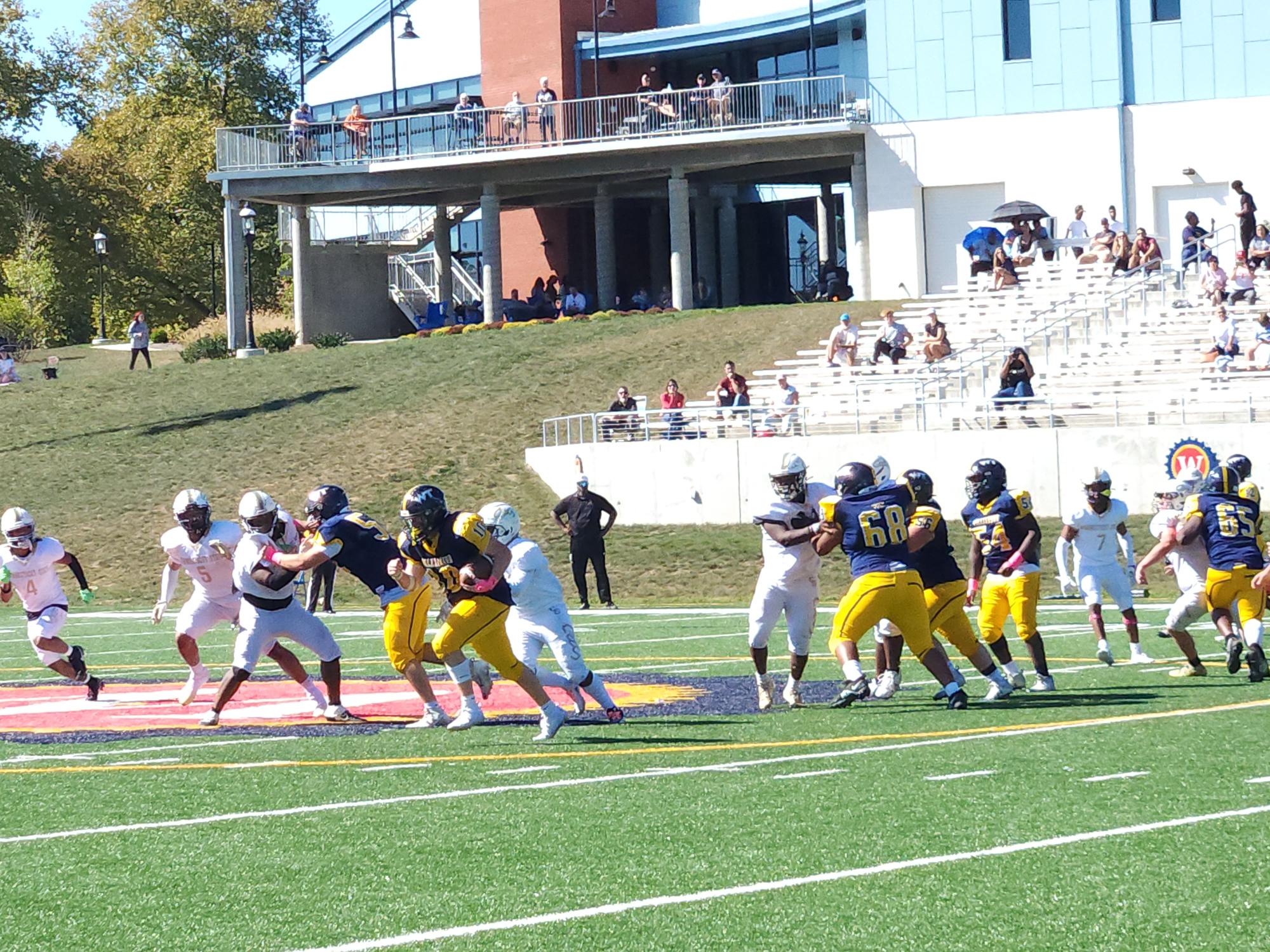 Carson Steinruck churning for some of his team leading 54 yards in Williamson's loss to Connecticut State