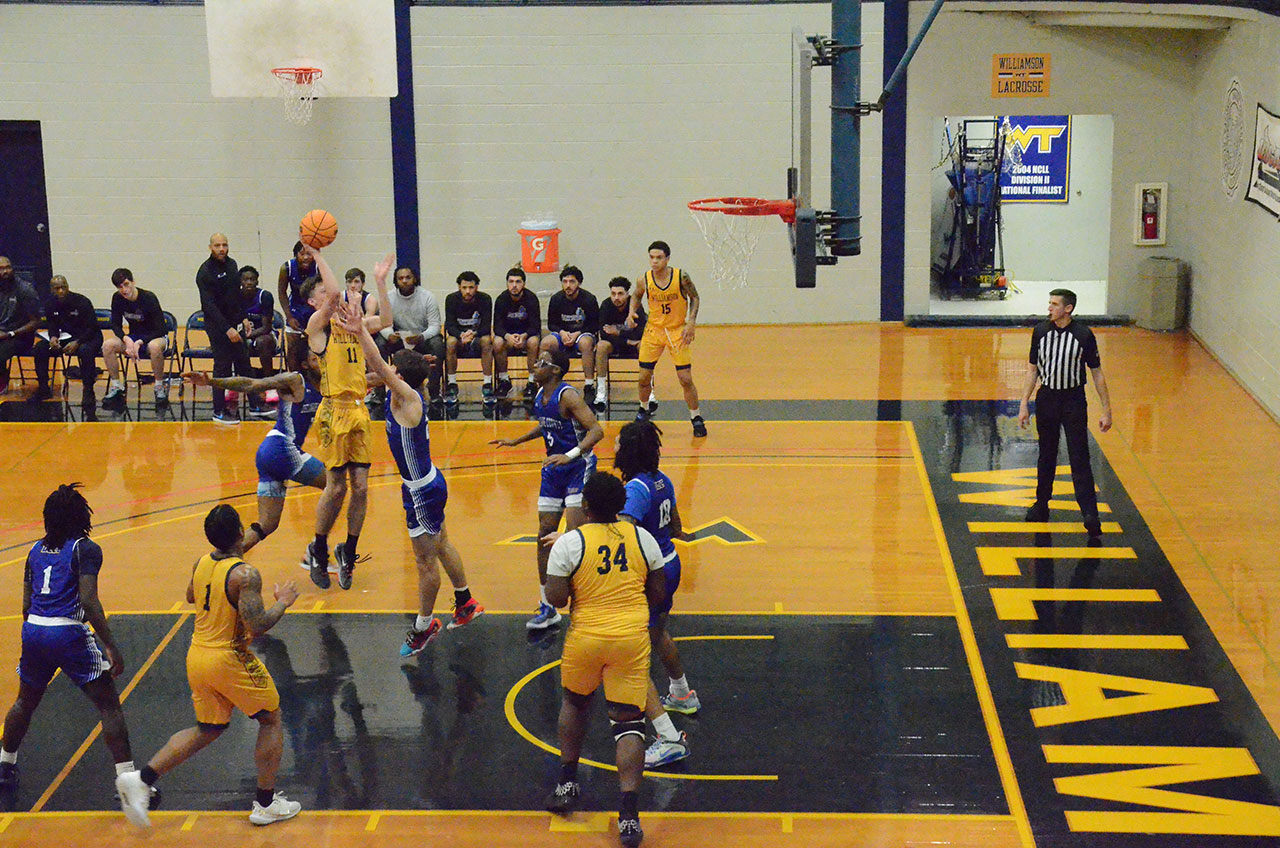 Liam Rardin scores for two of his 15 points in Williamson's 64-57 win over DCCC