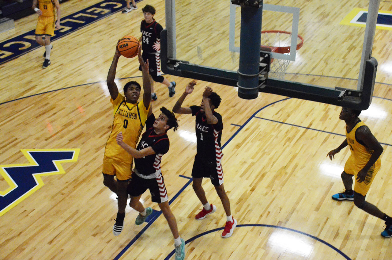 A'Jaad White hits for two of his game high 18 points in Williamson's 72-62 win over HAAC