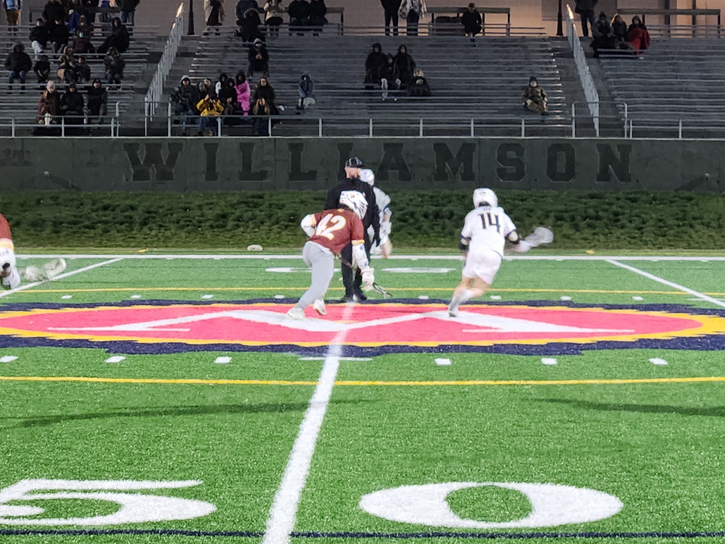 Nick Burdumy wins another face-off in Williamson's 6-4 victory over #22 Rowan University