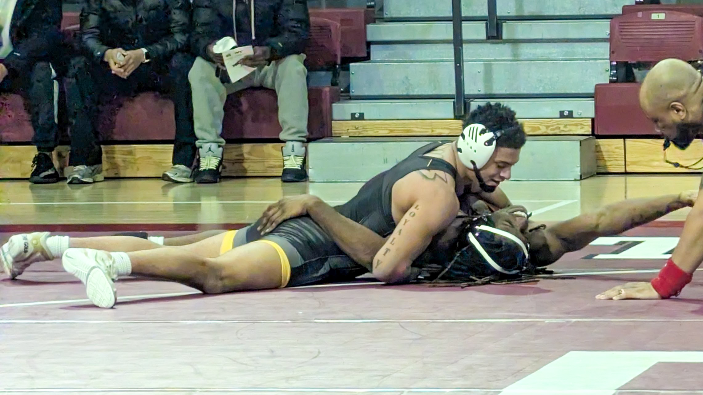 Wrestling Rallies to Down Temple